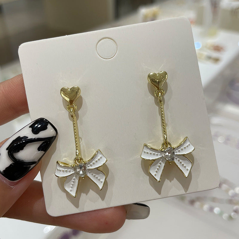 Wholesale Bow Oil Dripping Diamond Snowflake Earrings